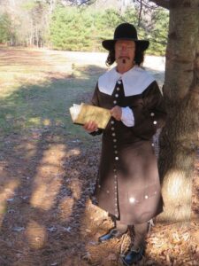 Man in colonial costume.